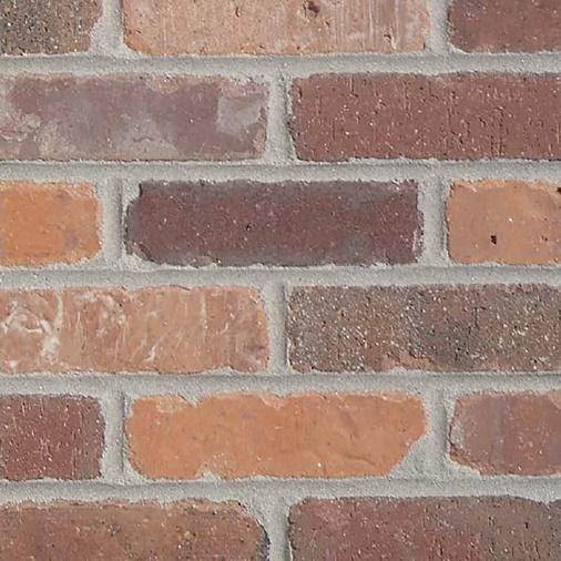 A close - up of a brick wall
Description automatically generated