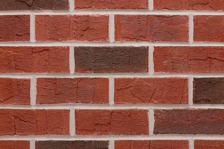 A picture containing brick, building material, building, outdoor
Description automatically generated