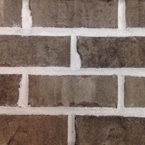 A picture containing building, brick, tiled, building material
Description automatically generated