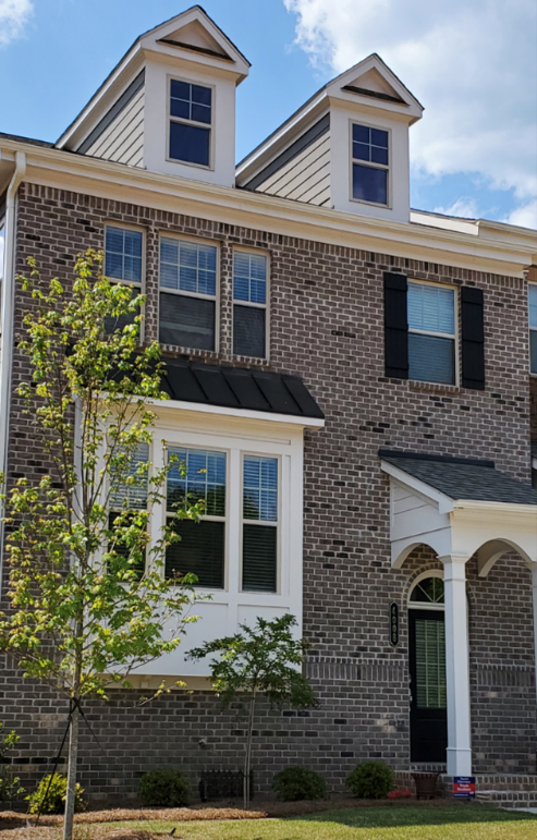 A house with a tree in front
Description automatically generated with low confidence