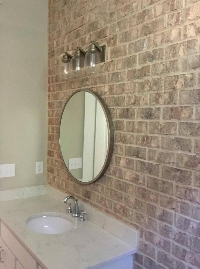 A bathroom with two sinks
Description automatically generated with low confidence